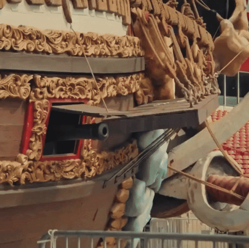 Ornate Ship With Red Window And Cannon GIF