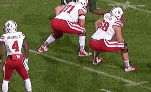 Out Of Balanced Huskers Football Player GIF
