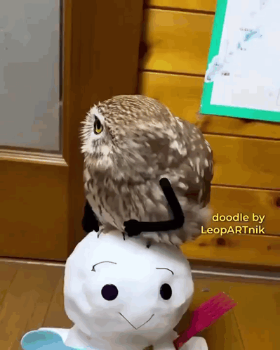 Owl Sitting on Stuffed Snowman Doodle by Leopartnik