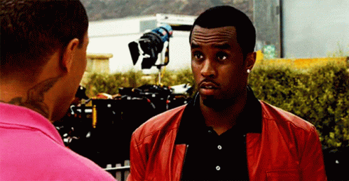 P Diddy Funny Meme In Red Suit GIF