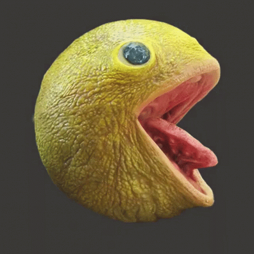 Old Pac Man Showing Tounge GIF