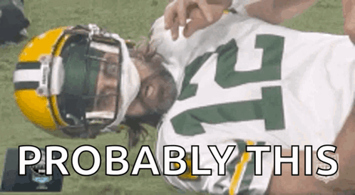 Packers Player Laying on Field Saying Probably This