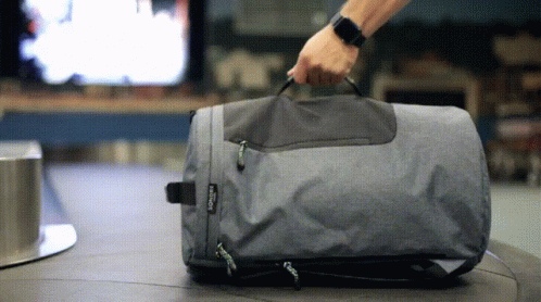 Packing Duffel Bags GIF