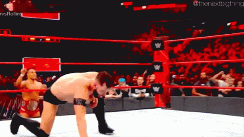 Painful Curb Stomp Seth Rollins GIF