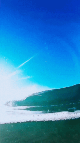 Painting of Wave Breaking on Sunny Day