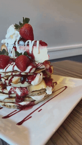 Pancake Stack With Strawberries And Whipped Cream GIF