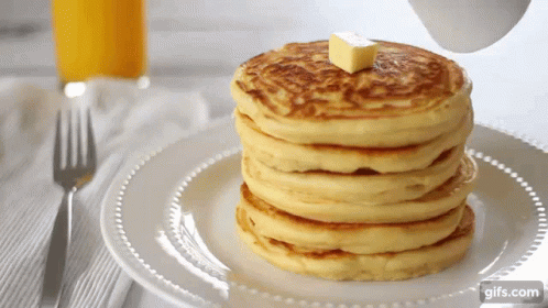 Pancake Tower Poured With Syrup GIF
