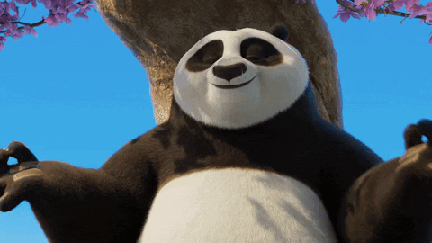 Panda Bear Sitting in Front of Tree