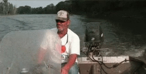 Panda Bear With Fishing Rod And Orange Juice In Boat GIF