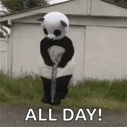 Panda Mascot Jumping On Pogo Stick In Grass GIF
