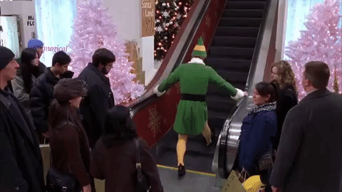 Papa Elf Afraid Of Escalator GIF