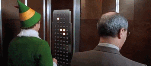 Papa Elf Playing Elevator Buttons GIF