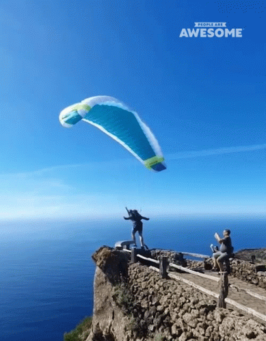 Paragliding Over The Ocean GIF