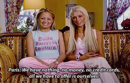 Paris Hilton And Nicole Richie Sitting At Couch GIF