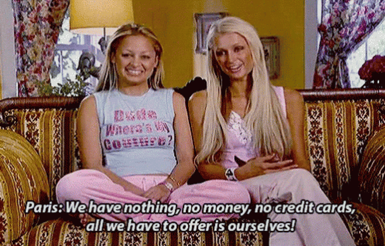 Paris Hilton And Nicole Richie Sitting At Couch GIF
