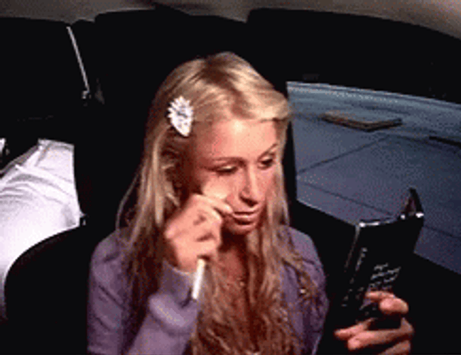 Paris Hilton Doing Her Makeup GIF