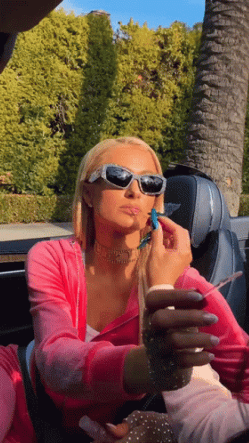 Paris Hilton Wearing A Lipstick GIF