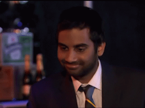 Parks And Rec Smiling Aziz Ansari GIF