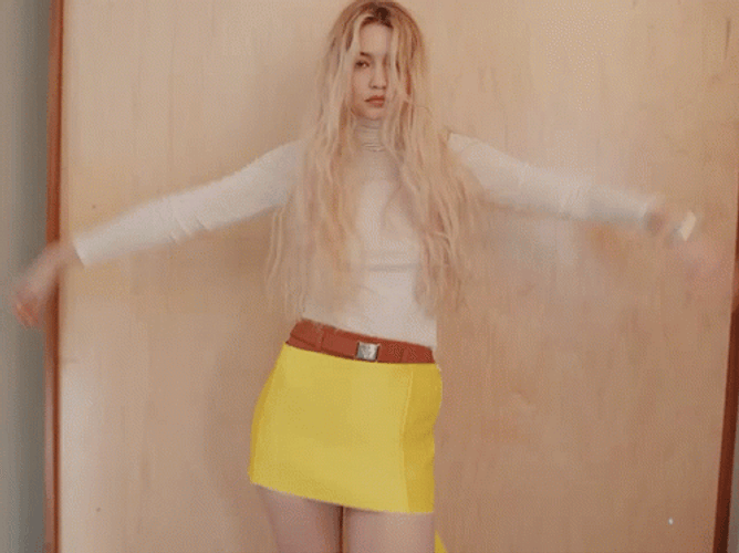 Pastel Orange Aesthetic Model Posing GIF