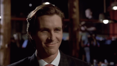 Patrick Bateman Talking Happily GIF