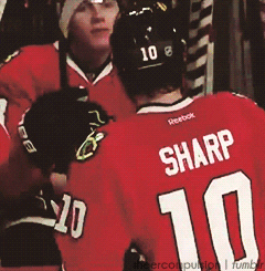 Patrick Kane Talks With Teammate GIF