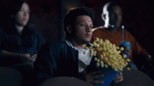 Fiunny Patrick Mahomes Spilling His Popcorns GIF