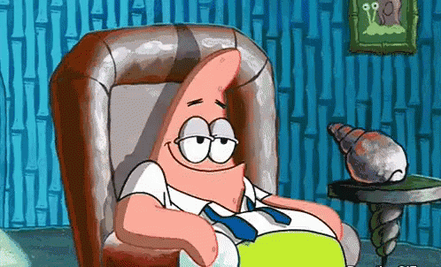 Patrick Star From Spongebob Is Sitting In A Chair With His Eyes Closed GIF