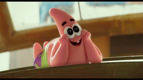 Patrick Star From Spongebob Squarepants Is Laying On A Table With His Hands On His Face GIF