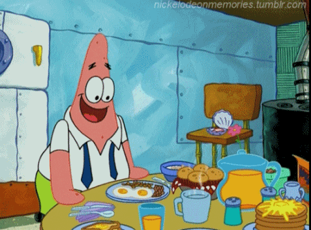 Patrick Star From Spongebob Squarepants Is Sitting At A Table Eating Breakfast GIF