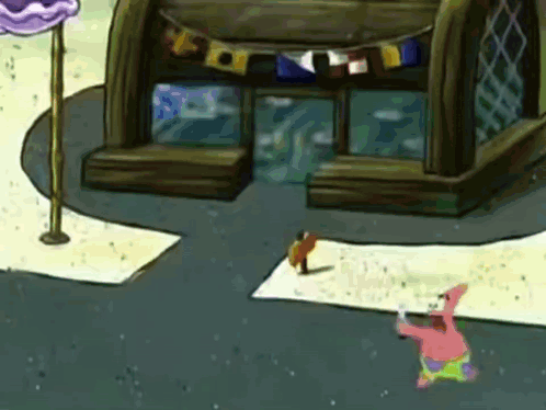 Patrick Star From Spongebob Squarepants Is Standing In Front Of A Building With Flags On It GIF