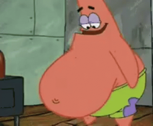 Patrick Star From Spongebob Squarepants Is Standing In Front Of A Stove . GIF