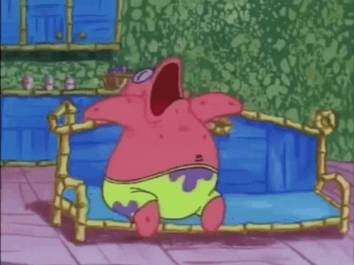 Patrick Star From Spongebob Squarepants Is Standing On A Blue Couch With His Mouth Open . GIF