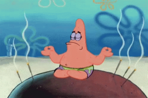 Patrick Star From Spongebob Squarepants Sits In A Lotus Position On A Rock GIF