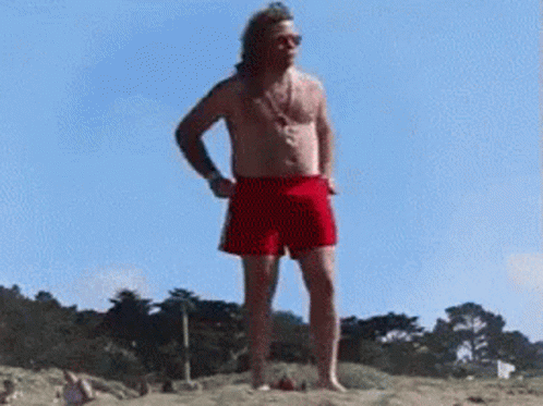 Patriotic Guy Removes Shorts GIF
