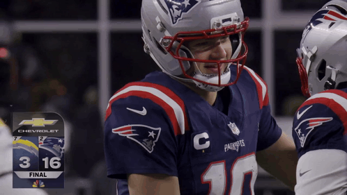 Patriots Player In Helmet Talking To Another Player GIF