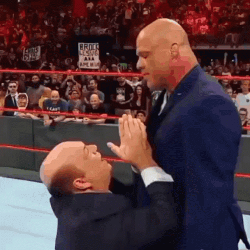 Paul Heyman Kneel Down To Brock Lesnar GIF