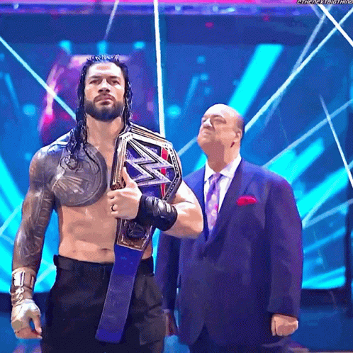 Paul Heyman Proud With Roman Reigns GIF