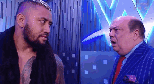 Paul Heyman Wipes Face GIF