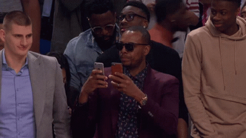 Paul Pierce Using Two Phones GIF