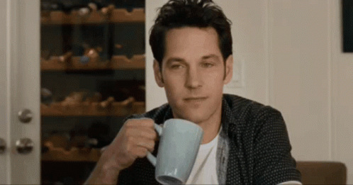Paul Rudd Holding Cup Of Coffee GIF