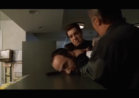Paulie Walnuts Beats Guy With Clock GIF