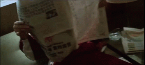 Paulie Walnuts Reading Newspaper GIF