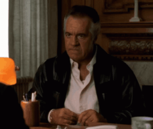 Paulie Walnuts Shrugs GIF