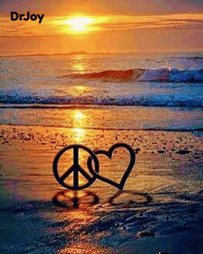 Peace Sign and Heart in Sand on Beach