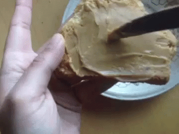 Drawing Heart Over Peanut Butter GIF