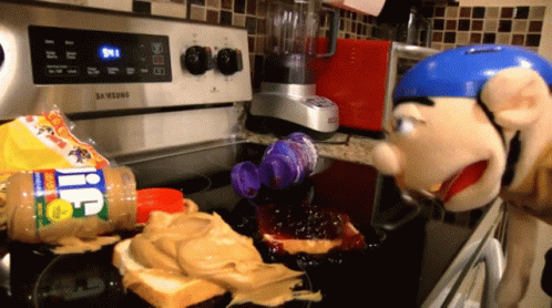 Puppet Heating Up Peanut Butter Sandwich GIF