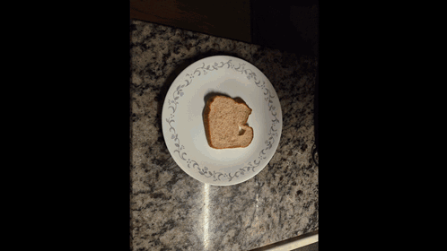 Peanut Butter Bottle Next To Toast And Knife GIF