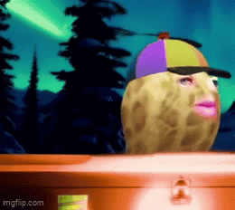 Peanut Wearing Colorful Hat and Pink Lip Beside Suitcase