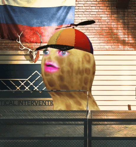 Peanut with Hat and Pink Lips in Front of Tactical Intervention Sign