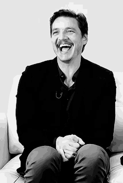 Pedro Pascal Happy Laughing Black Suit GIF
